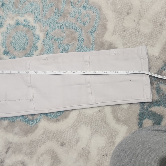 Frame grey denim pants small hole on right back pocket pointed out. Runs small - Picture 2 of 4